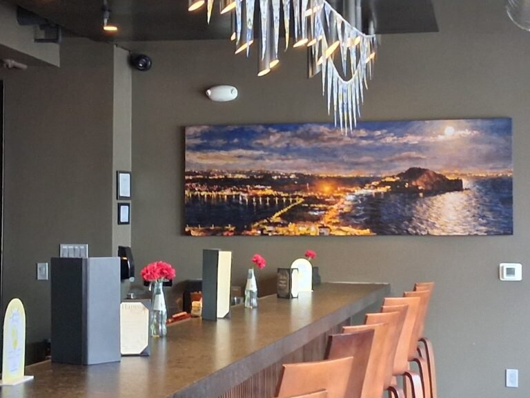 La Cucina long dining table under pendant lights